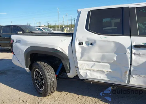 2025 Toyota Tacoma Hybrid Trd Off Road from USA, damaged, VIN 3TYLC5LN7ST047961
